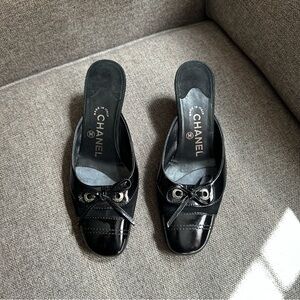Vintage black Chanel bow mules